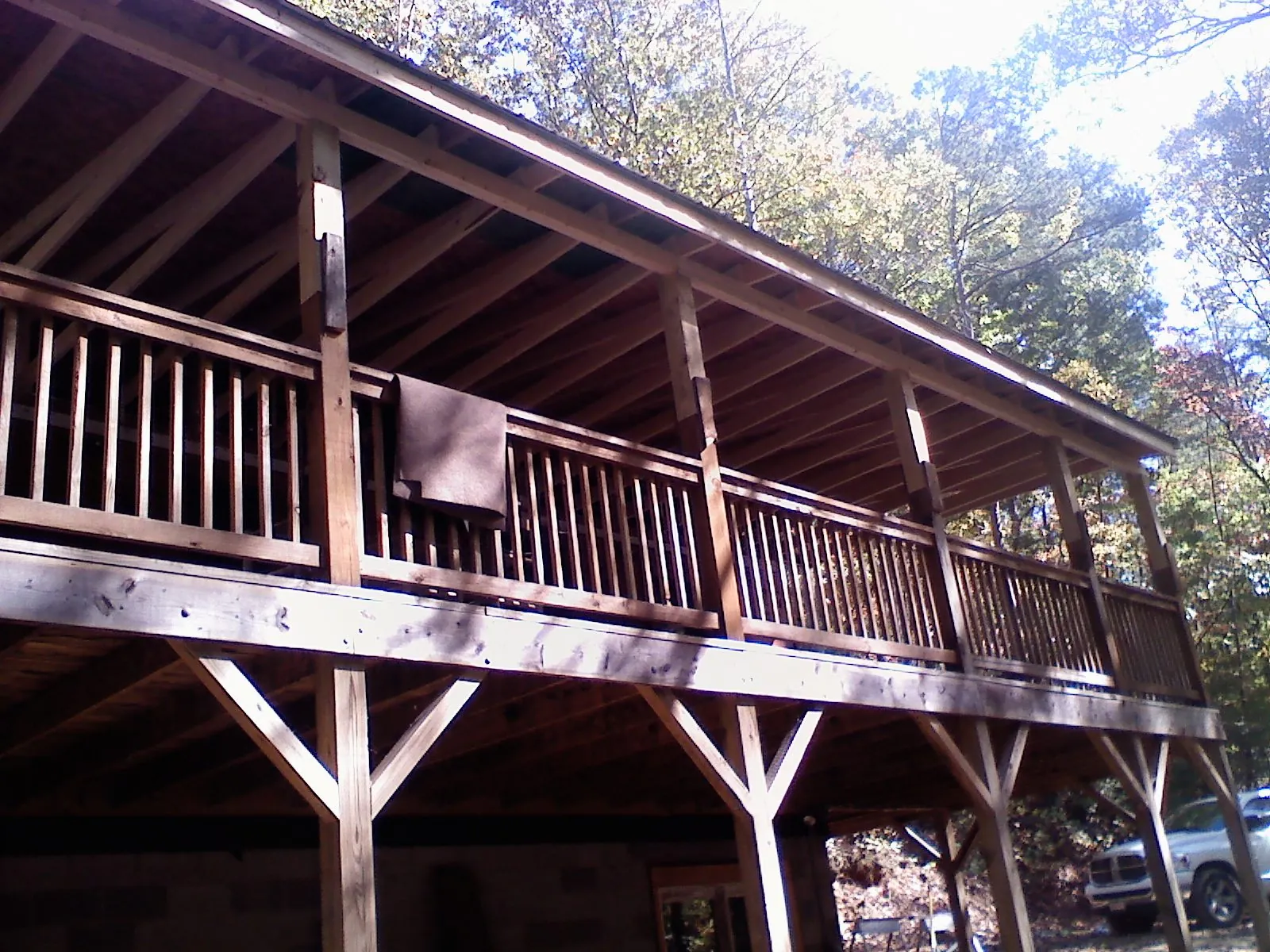 Timber framing under a new elevated porch and deck — Roof Leak Repair in Dripping Springs by Roofing Brothers